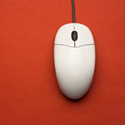 computer mouse on orange background