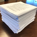 tall stack of signed petitions
